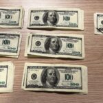Mann versucht gefälschte Dollarscheine einzuzahlen