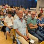„Podiumsdiskussion im Grünen Norden: Keller verteidigt Bauprojekt – Kandidaten debattieren hitzig über Wohnraum und Umweltschutz“